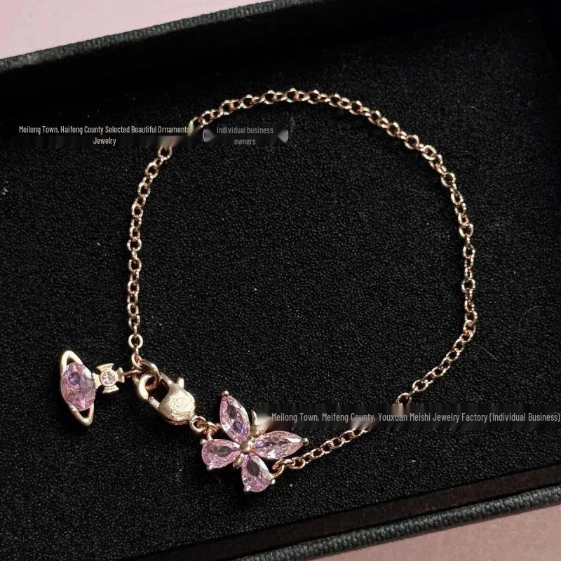 Empress Dowager Butterfly Zircon Jewelry Set: Rhinestone Necklace, Bracelet, Earrings with Asymmetric Saturn Design