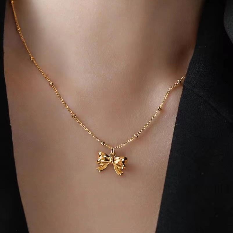 Bow Pearl Beaded Necklace for Women, 18K Gold-Plated Titanium Steel, Clavicle Chain, Simple, Ruyi-Inspired Design.