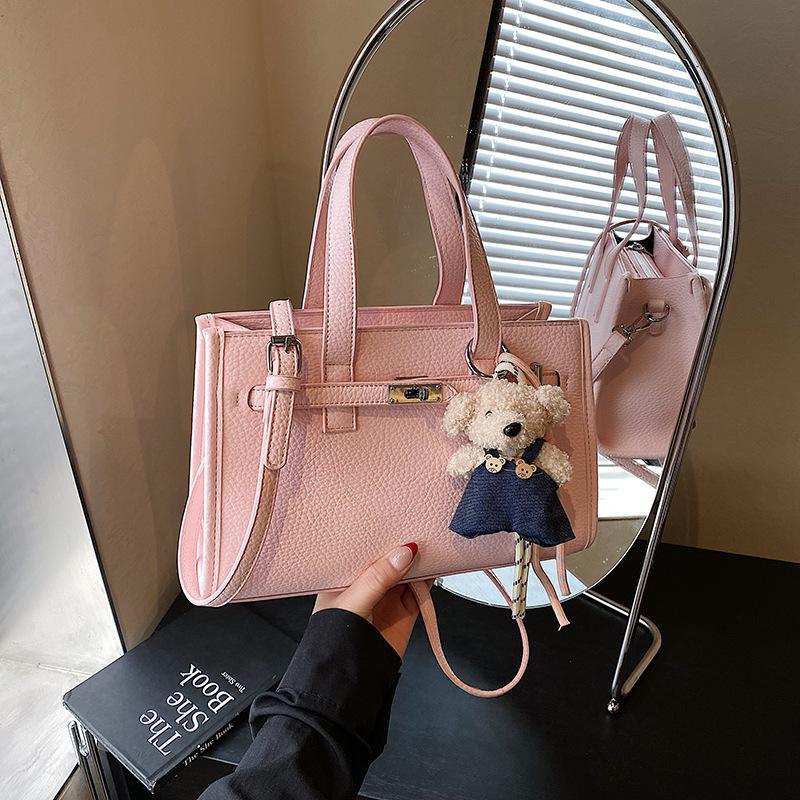 Niche portable small square bag women's new fashion versatile simple shoulder bag casual commuter messenger bag