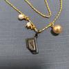 Used q-pot chocolate necklace