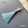 Versatile New Year Decoration: Lotus Tassel Bookmark, Fan, and Mobile Chain