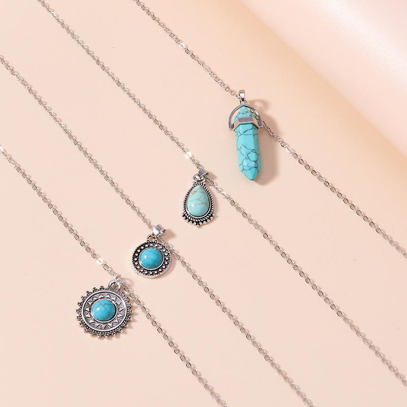 Collana in stile etnico vintage con goccia d'acqua, collana turchese, pilastro esagonale con sole