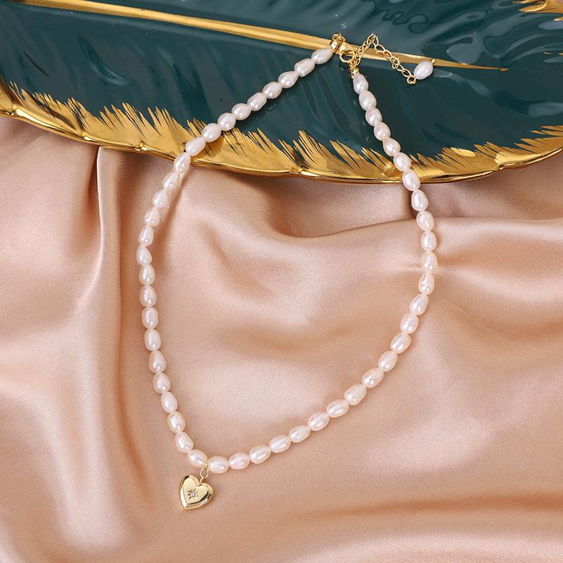 Natural freshwater pearl necklace, star heart pendant, pearl necklace, niche design, high-end sweater chain.