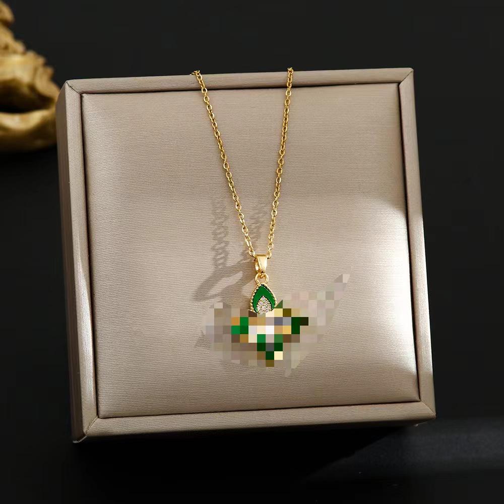 Elegant Gold-Plated Chinese-Style Four-Leaf Clover Necklace with Imitation Hetian Jade Pendant for Women