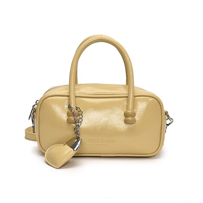 Korean Version of Fashionable Simple Retro Solid Color Portable Boston Bag Casual Versatile Solid Color Commuting Foreign Style Messenger Women's Bag