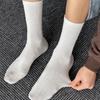 Men's Mid-Calf Cotton Socks, Fall/Winter, Solid Colors, Massage Sole, Breathable, Versatile Sports Style, Black and White.