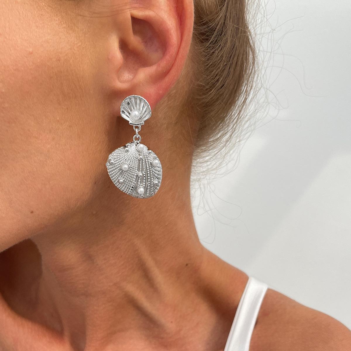 

Літній пляж Ocean Exaggerated Star Stud Earrings Personalized Trendy Vacation Imitation Pearl Morrish Star Metal Earring for Women Girl