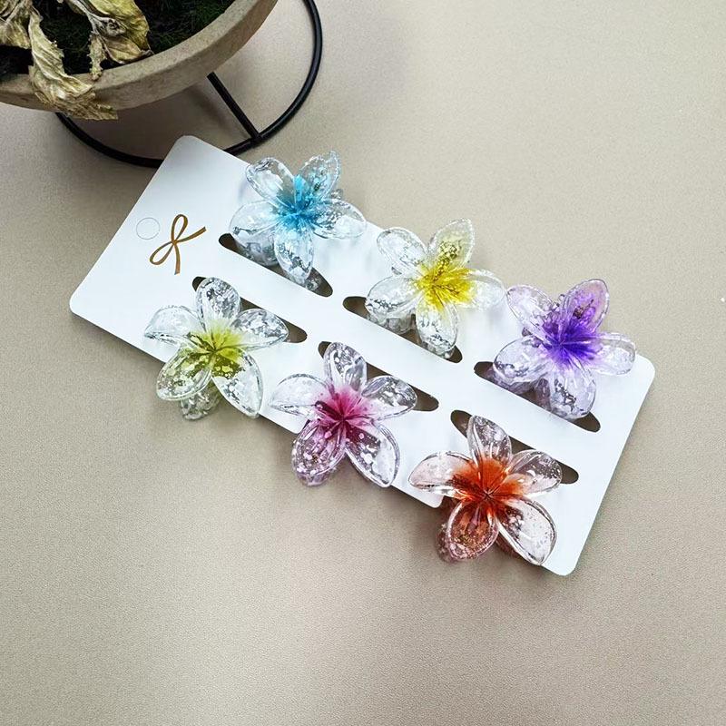 European & American 4CM Frangipani Claw Clip Hairpin - Fashionable Vacation Floral Accessory.
