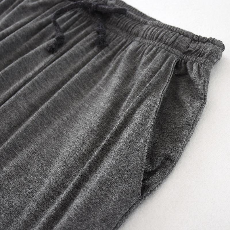 Pánské tenké pyžamové kalhoty měkké kalhoty chladivé stahovací elastické kalhoty na spaní volné tepláky s kapsami prodyšné ležérní kalhoty na atletickou jógu pro muže