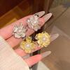Luxury Pearl Flower Stud Earrings: Chic European & American Metallic Design for Women