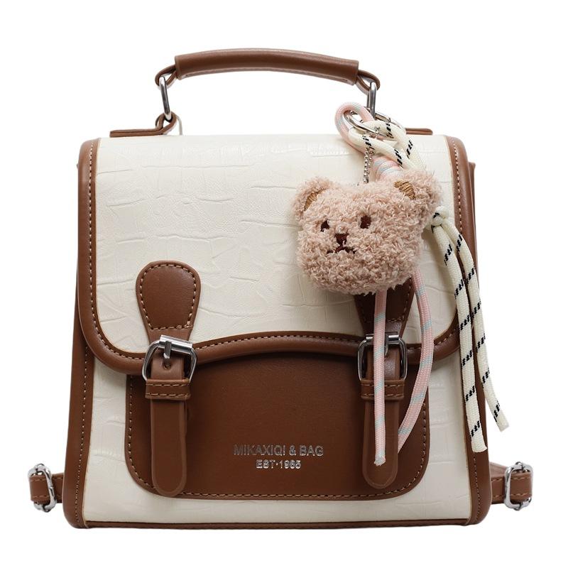 

New Fashion Handbag Women s Large-capacity Travel Backpack With pendant коричневий