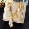 DIEYURO 316L Stainless Steel Gold Plated Conch Devil Fish Starfish Fan Betto Pendant Necklace Lady Ocean Neck Chain Gift