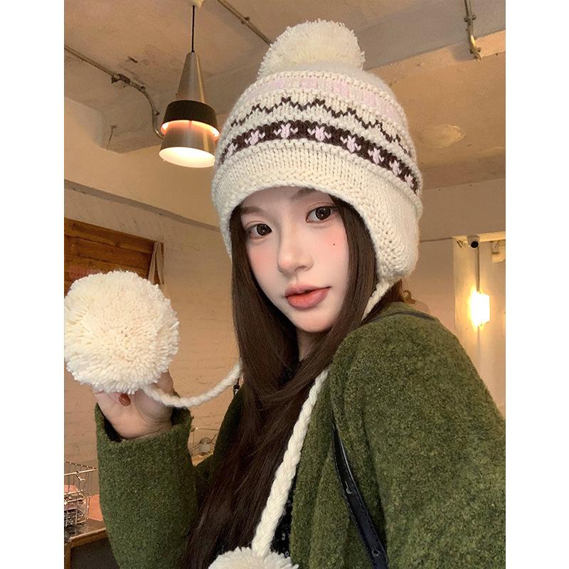 Autumn and winter Korean retro hairball knitted wool hat women's thickened cold-proof and warm ear protection Lei Feng hat shows small face