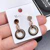 Japanese and Korean 18K Rose Gold Titanium Steel Zircon Stud Earrings, Femininity Simple Four-leaf Clover Black Earrings Internet Celebrity
