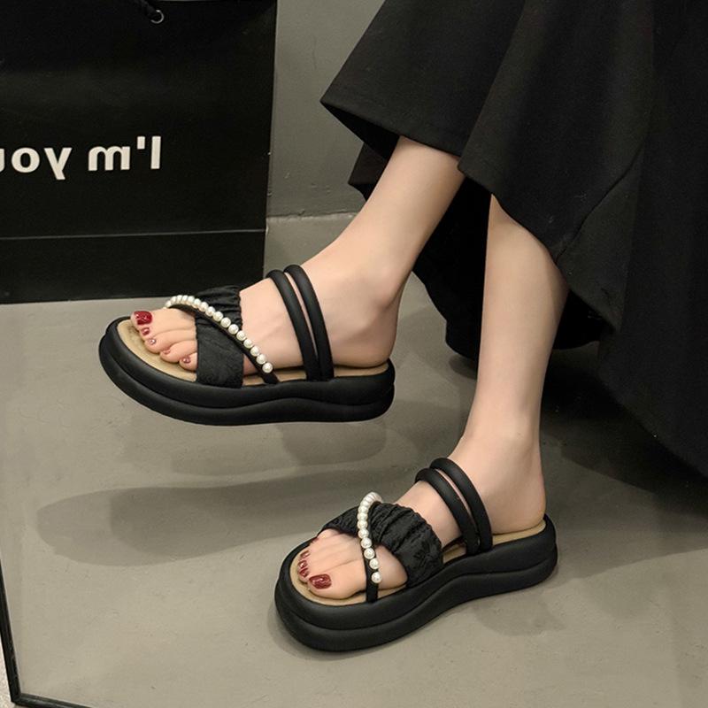 

Национальный стиль тапочки двойного ношения женские 2025 новые летние толстоподошвенные нескользящие сандалии для улицы мягкая подошва с юбками римские сандалии 35 чёрный