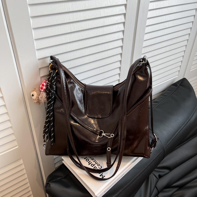 

Large-capacity commuter tote bag women s 2025 new leisure niche design single shoulder messenger bag three-purpose bag backpack single bag