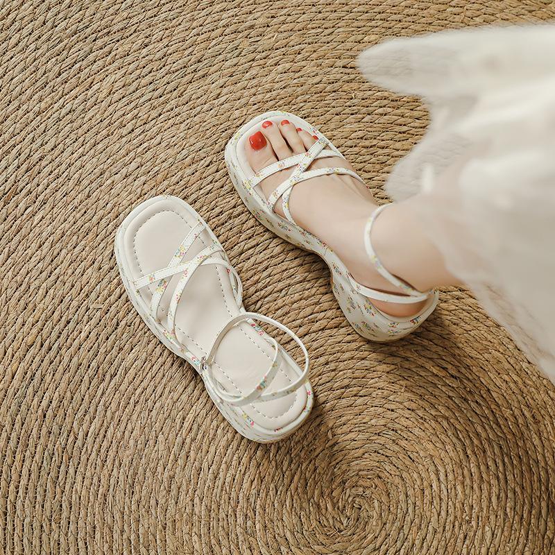 Sweet and cool wind thick-soled wedge sandals women's height increase 7cm muffin waterproof table one-word buckle belt summer new Roman shoes