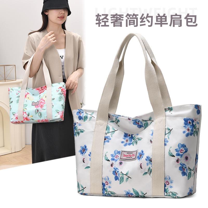 Neue Handtasche mit großem Fassungsvermögen für Damen, Hand-Canvas-Tasche für die Arbeit, Pendler-Damentasche, Muttertasche, bedruckte Umhängetasche