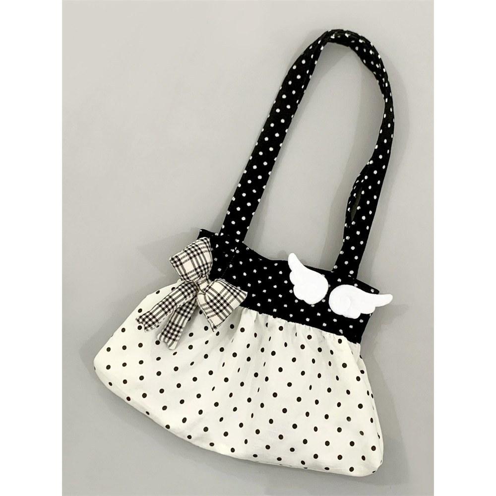 Niche design black and white polka dot canvas bag women's lazy style ancient commuting shoulder bag bow handbag