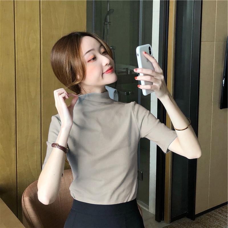 2027 Toma Real: Camiseta de Manga Corta con Cuello Alto Medio Ajustada para Mujer (95 % algodón, 5 % elastano.)