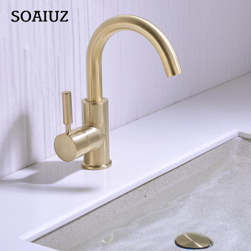 

Раковина из матового золота. Смеситель для холодной и горячей воды с одной ручкой и выдвижным сливом. Черный смеситель для раковины.