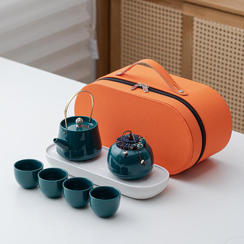 Portable Ceramic Kung Fu Tea Set: Teapot with Handle and Four Cups for Travel and Business Gifting