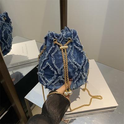 Niche Design Denim Rhombus Bucket Bag New Messenger European and American Trend Drawstring Fringed Pearl Chain Messenger Bag