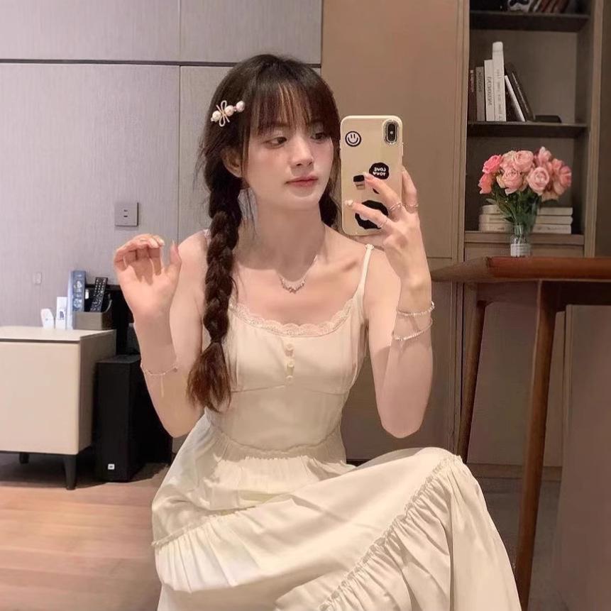 

Летнее платье 2025 года цвета лунного света, облегающее талию, средней длины, на бретелях-спагетти Medium абрикосовый