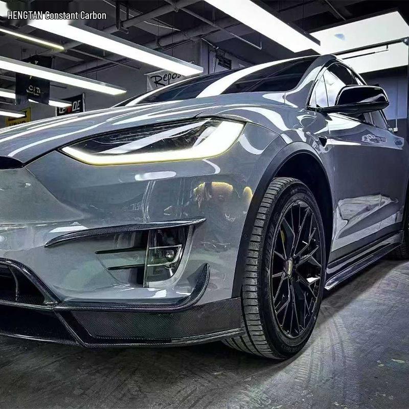 Tesla Model X RZ Carbon Fiber Body Kit: Front Lip, Modified Bumper, Rear Lip, Side Skirts.