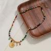GEMCHIC Women's Colorful Beaded Necklace with Geometric Sun Pendant, Vintage Ethnic Style Natural Stone Choker