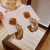 Maillard coffee color oval earrings niche simple versatile stud earrings fashion temperament high sense earrings women