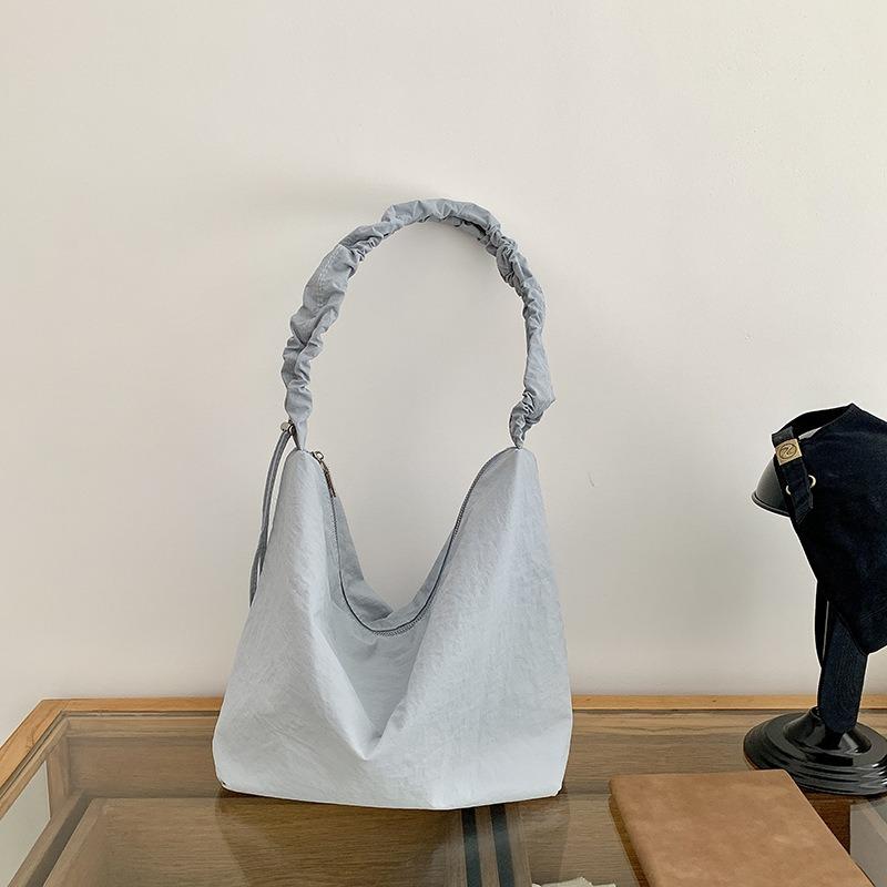 Shoulder bag women's senior sense spring and summer versatile commuter dumpling bag nylon drawstring pleated casual messenger bag women