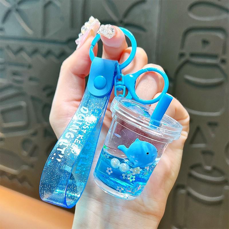 Exquisite Quicksand Panda Keychain: Cartoon Oil-Filled Doll Bag Pendant and Car Accessory