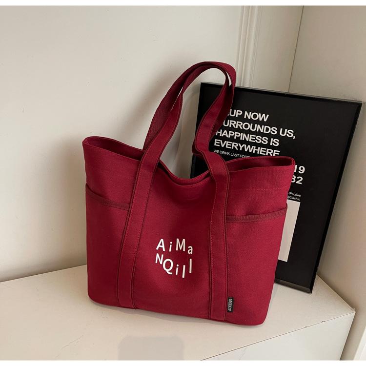 Lässige Canvas-Tragetasche Damen Herbst und Winter Schlichte Große Kapazität Ausgehen Leichte Tragetasche Pendlertasche