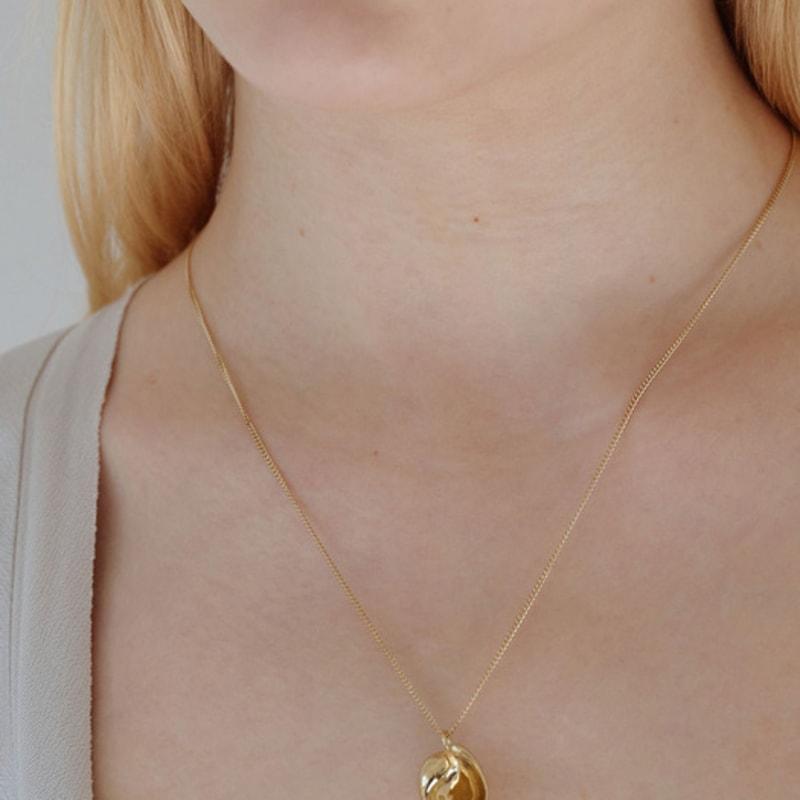 

YUNICITE SEASHELL N (S) GOLD