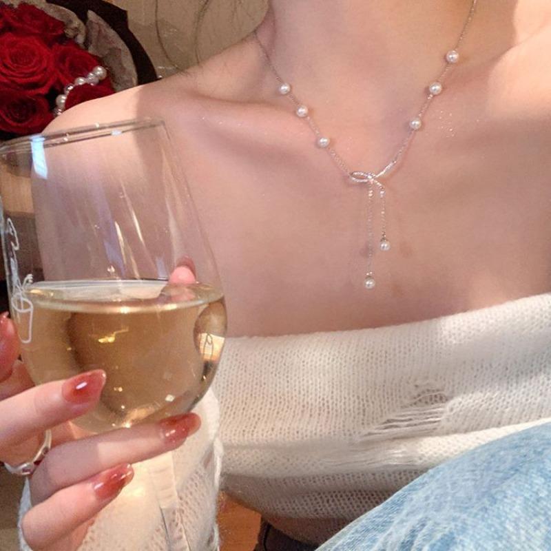 Spice Girl Bow Necklace Women's Versatile Premium Sense Niche Tassel Temperament Simple Pearl Clavicle Chain Jewelry