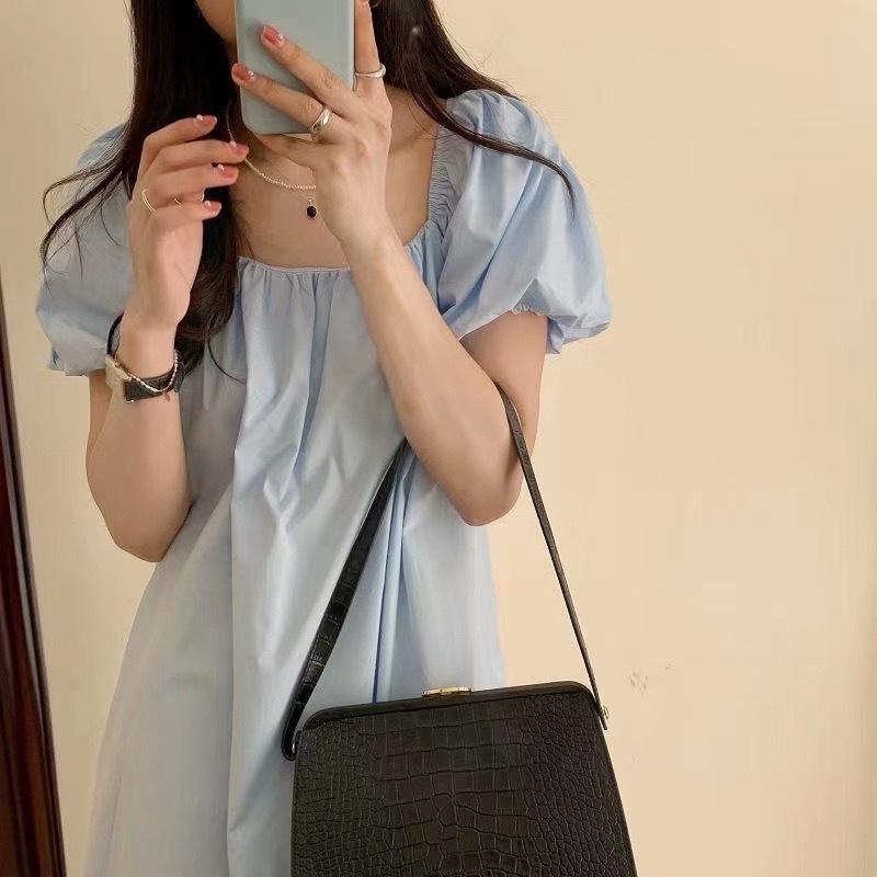 (There is a color) Seaside vacation one-word collar off-the-shoulder suspender skirt French temperament loose long skirt covering the meat