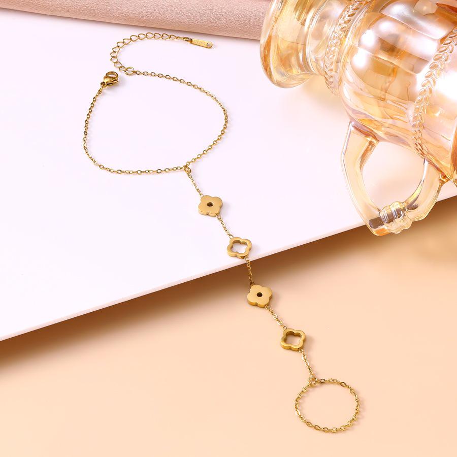 Titanium Steel Four-Leaf Clover Hollow Flower Hand Chain