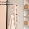 Nástěnný vertikální organizér na oblečení a klobouky.