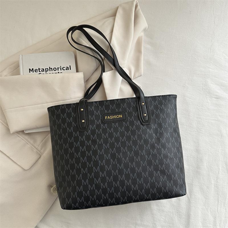 

Large-capacity bag women s 2025 new versatile printed portable commuter shoulder underarm high-value tote bag