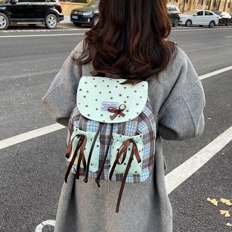 Schoolbag Elementary school student trend feeling backpack large capacity casual shoulder Korean mint green cute bow college style school bag