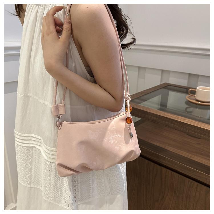 

New bag women s summer 2025 hot versatile women s ins shoulder pleated bag fashion trend crossbody bag рожевий