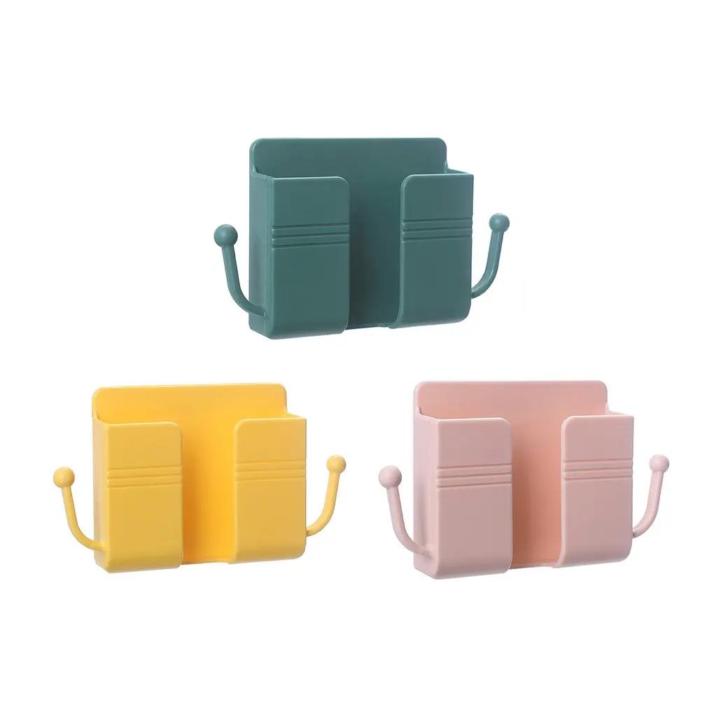 Neue Wandhalterung Telefonsteckerhalter Handy Ladeständer Klimaanlage TV Fernbedienung Aufbewahrungsbox Heimaufbewahrungshalter