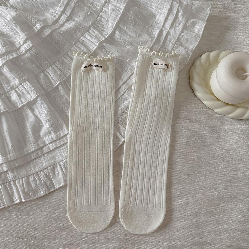 Female Spring and Autumn Pure Color Draw A Letter Cloth Label Ear Side In The Tube Pile Socks