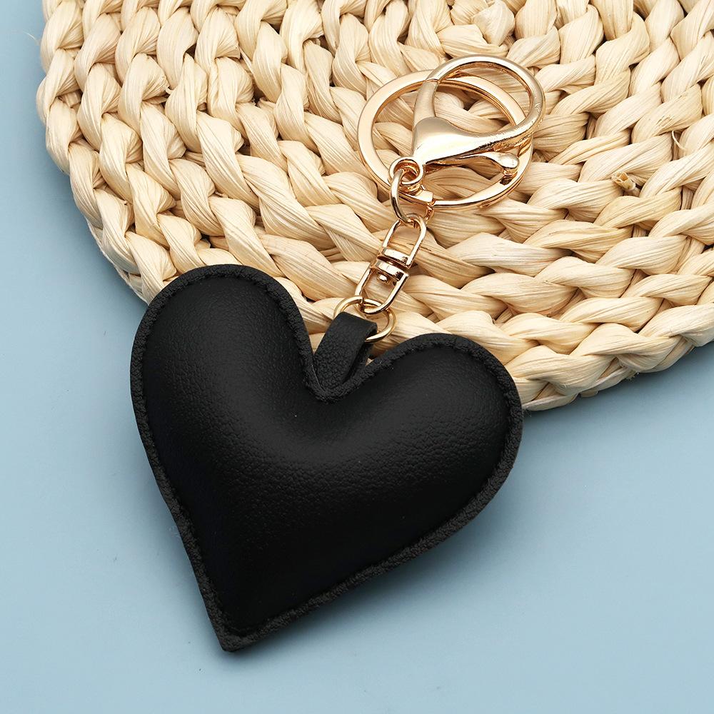 Spot wholesale PU simple peach heart bag pendant Xiaohongshu explosive love couple pendant keychain bag lanyard