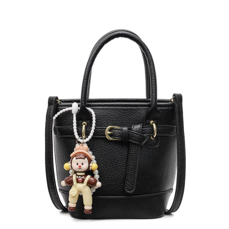 Hot sale in spring and summer Korean simple lychee pattern texture portable bucket bag casual commuting versatile solid color messenger women's bag