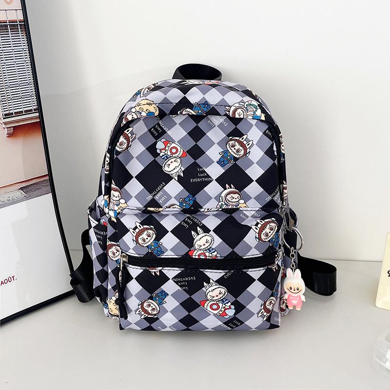 

Детский рюкзак мультяшный новый детский сад милый большая вместимость рюкзак 2025 модный студенческий дорожный рюкзак чёрный