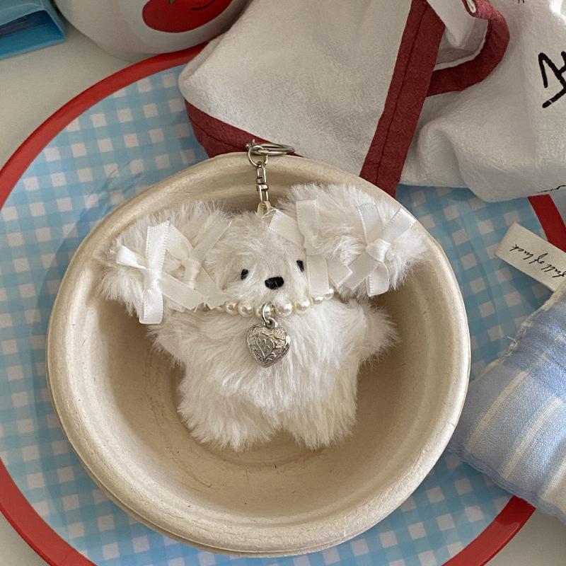 

Синее ожерелье с жемчугом в виде банта, подвеска в виде сумки-кролика, вязаный рюкзак, брелок в виде куклы-кролика