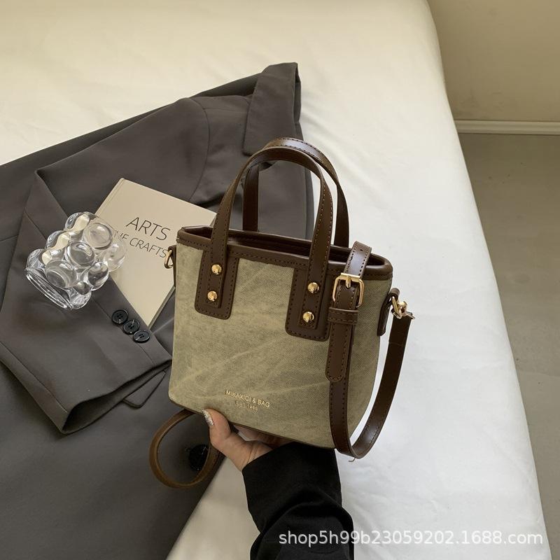 High-value Simple Portable Bucket Bag Women's Bag Autumn and Winter New Shoulder Messenger Bag Texture
