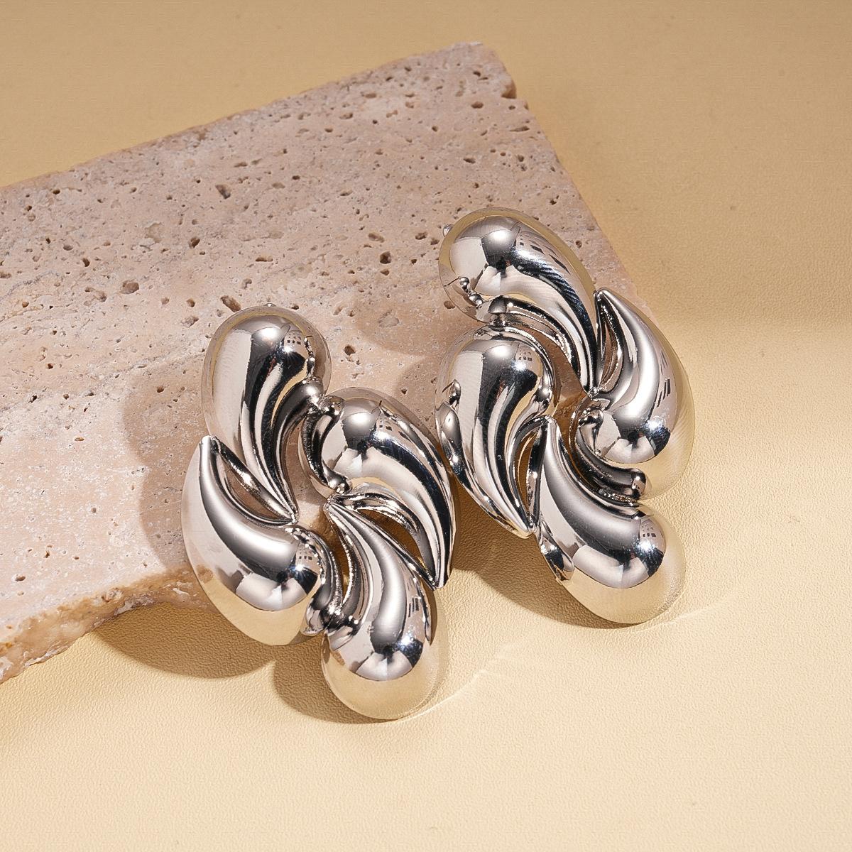 Metallic irregular water droplets twisted steel needle earrings cold wind sexy earrings
